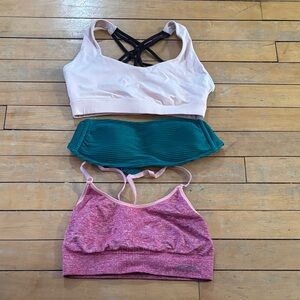 2 Sports Bras and One Bandeau swimsuit Top